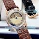 AAA replica Omega De Ville white face rose gold case moon phase automatic watch (7)_th.jpg